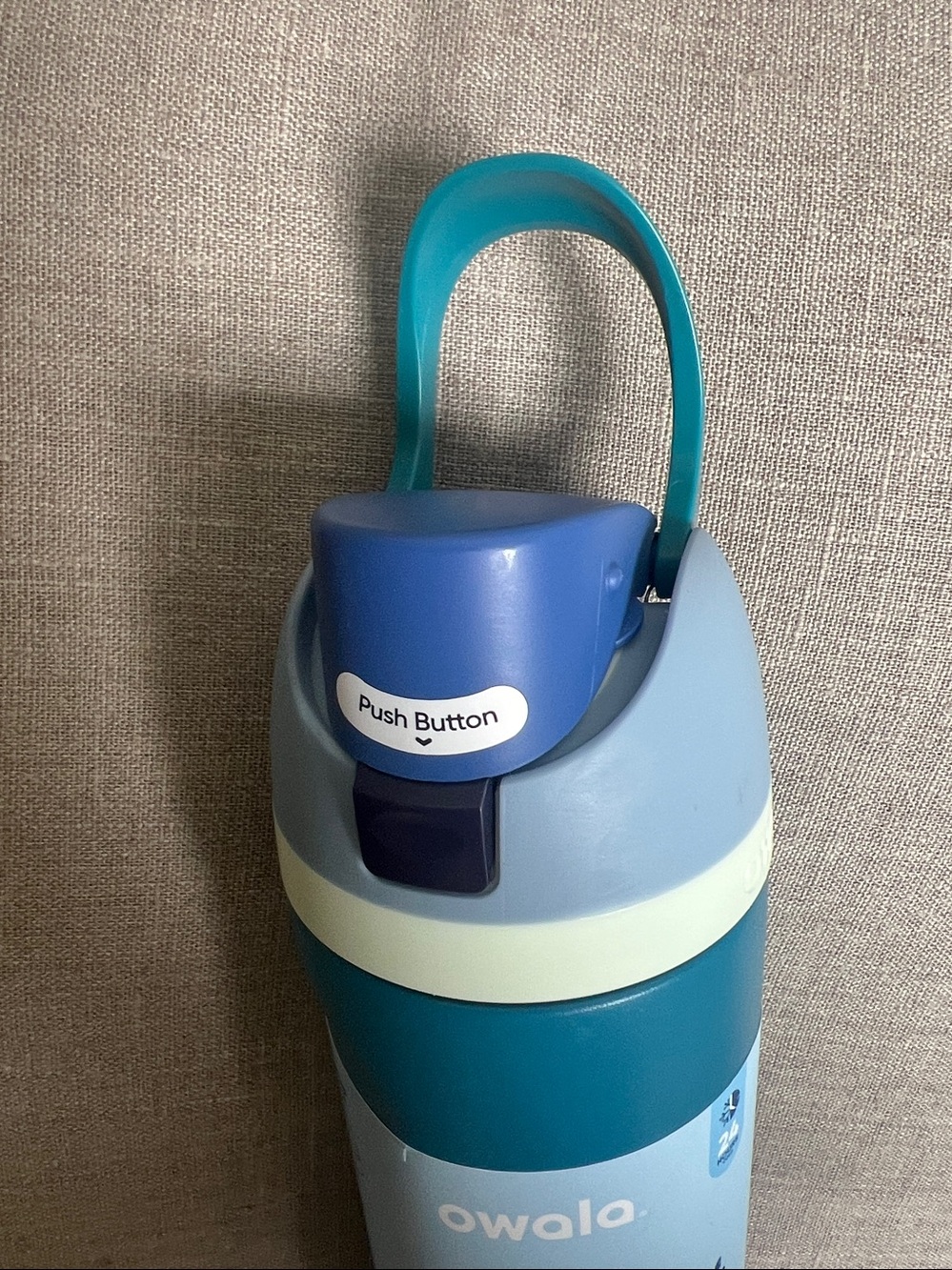 Owala FreeSip Stainless Steel Water Bottle in a 24 oz size blue & teal color - Picture 8 of 8